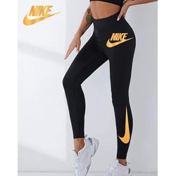 Leggin Nike en dorado para mujer - Imagen 1