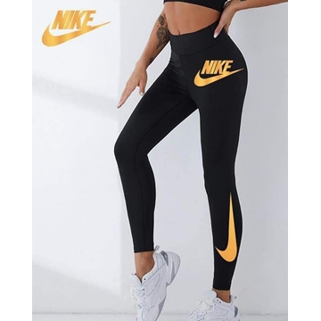 Leggin Nike en dorado para mujer - Imagen 1