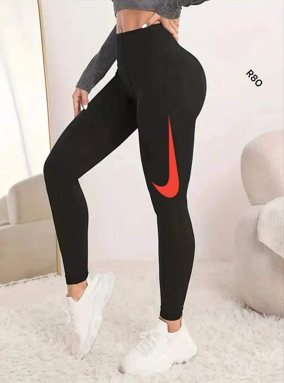 Leggin Nike en rojo para mujer - Imagen 1