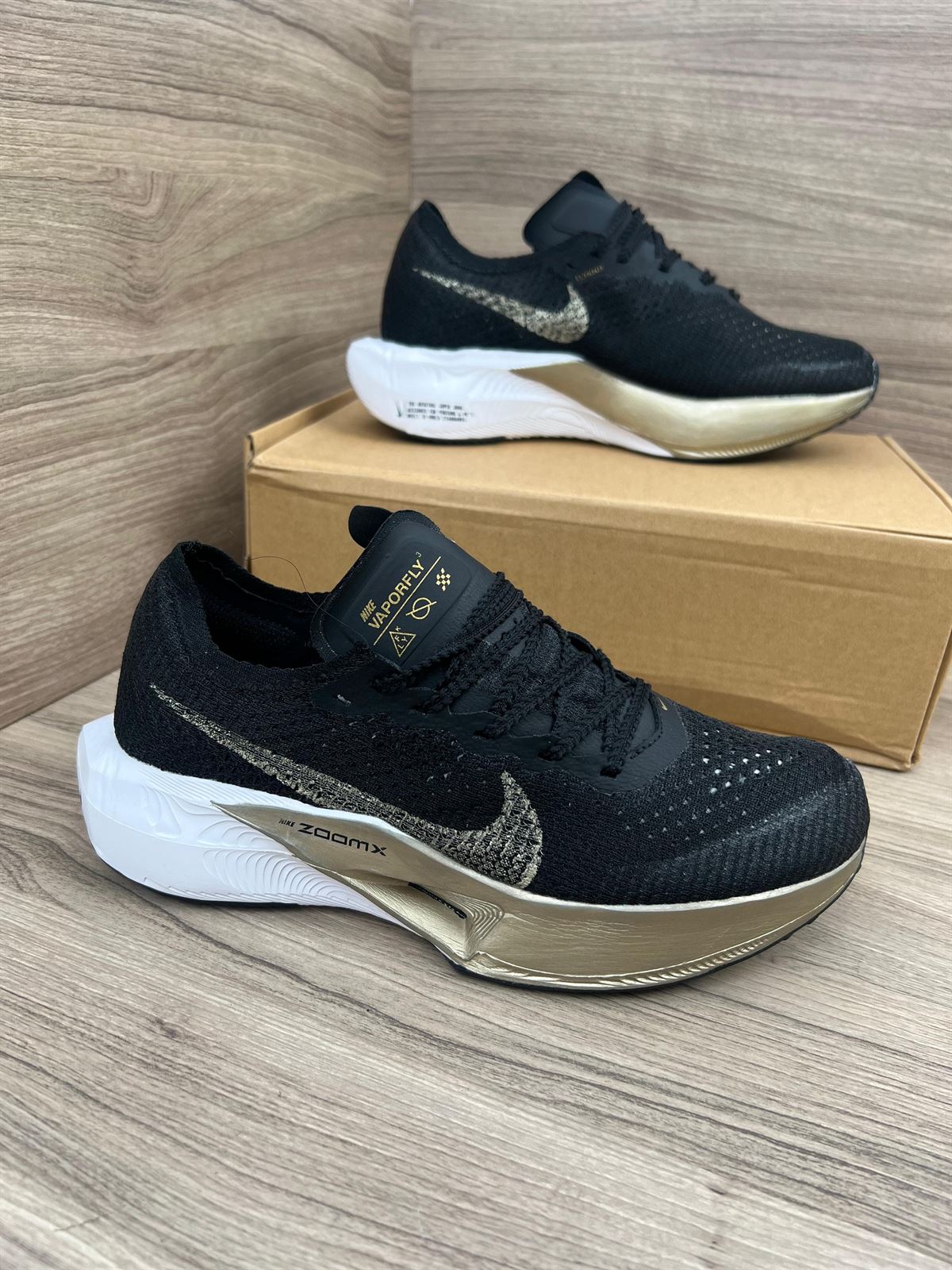 Zapatilla Nike w zoomx vaporfly black gold - Imagen 1