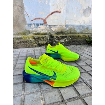 Zapatilla Nike w zoomx vaporfly fluorescente - Imagen 1